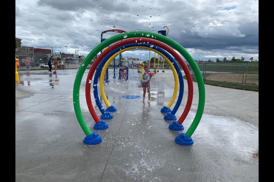 Casey Bailey, 5, a student at E.W. Norman was excited to try out the new splash pad this afternoon. Jeff Turl/BayToday.