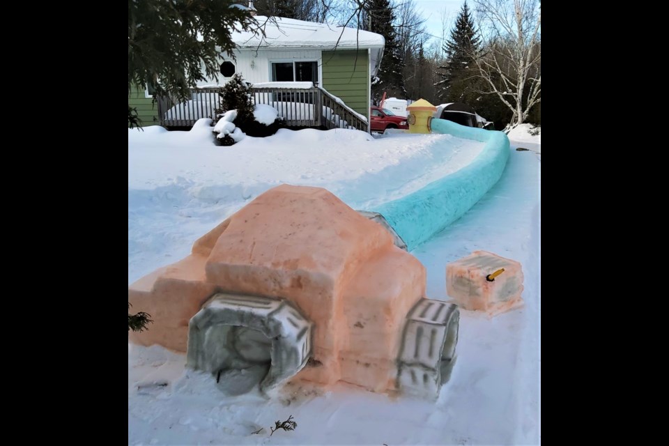 Doug Howe, of Astorville Road, took the top spot among the ice sculpture contest participants with his fire-fighting concept that featured a hydrant connected to a coupler by a 30-foot hose.