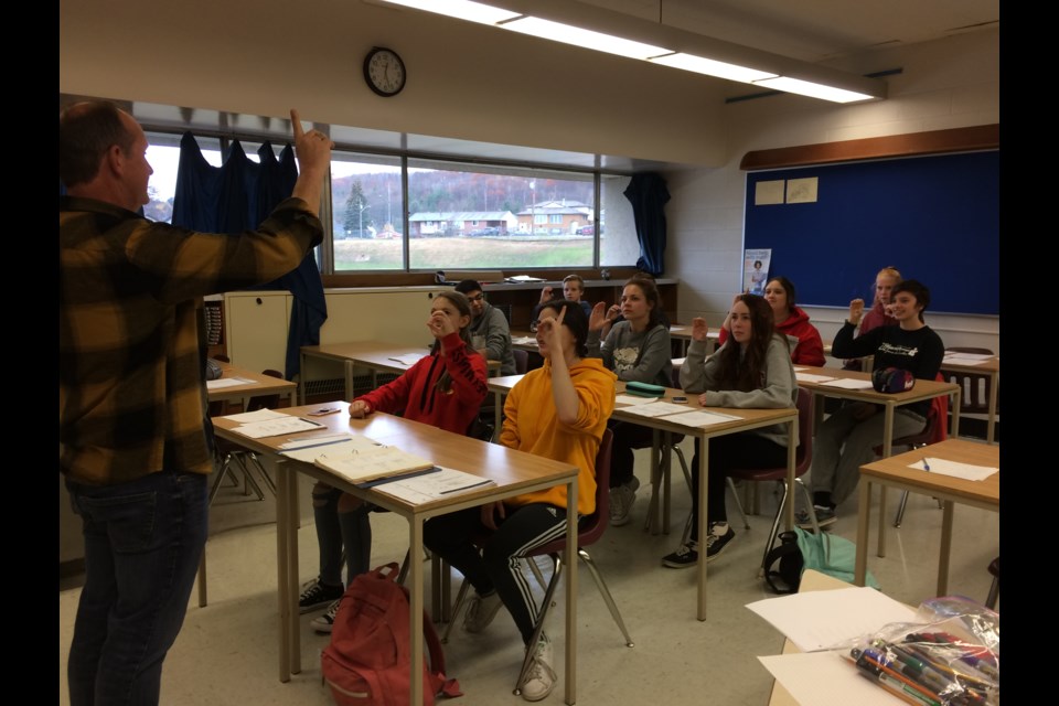 Students learn about sign language.  Photo by Hannah Knight.  