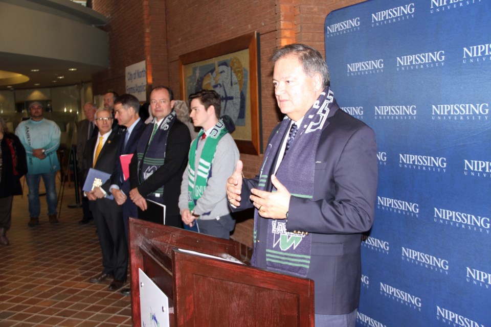 Dr. Mike DeGagne speaks to the crowd at the Nipissing University Economic Impact Study press event today.  Photo by Chris Dawson/BayToday.ca. 