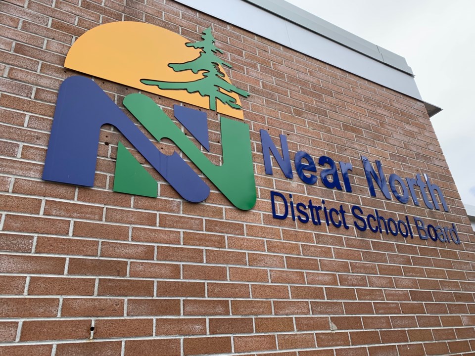 2019 0623 near north district school board logo on wall 1 turl