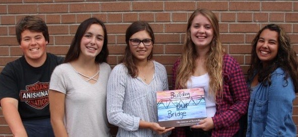 Student Authors Illustrator, Building our Bridge -  (left to right) Dawson Bloor, Mackenzie Elwes, Gracie Crafts, Sara Burns and Taylor Judge, co- authors with their award winning book.
Credit: Patti Jenkins, Teacher at Parry Sound High School