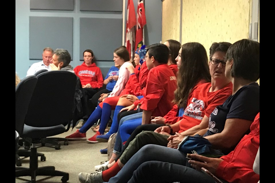 Students from Widdifield Secondary School listen to Public Presentations that were held at the Near North District School Board Office