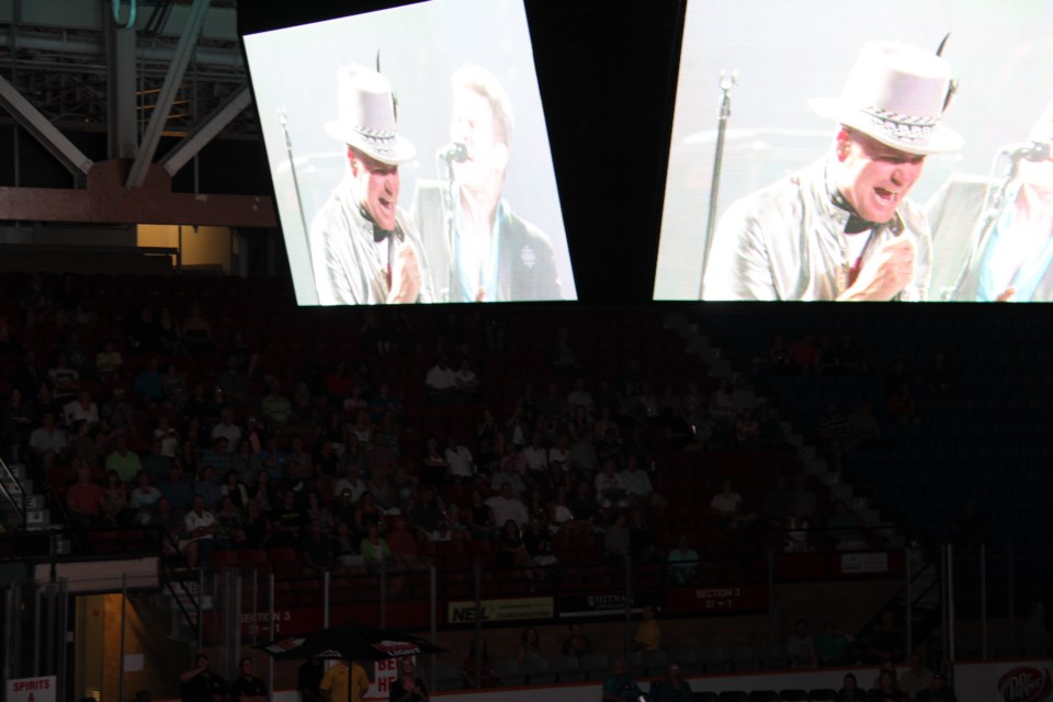 Gord Downie and The Tragically Hip peform via the jumbo screen at Memorial Gardens, Saturday, August 20