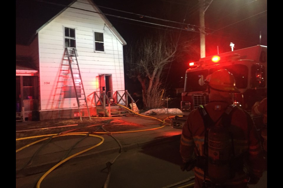 One man was pulled out of this house fire with vital signs absent Wednesday night. Jeff Turl/BayToday.