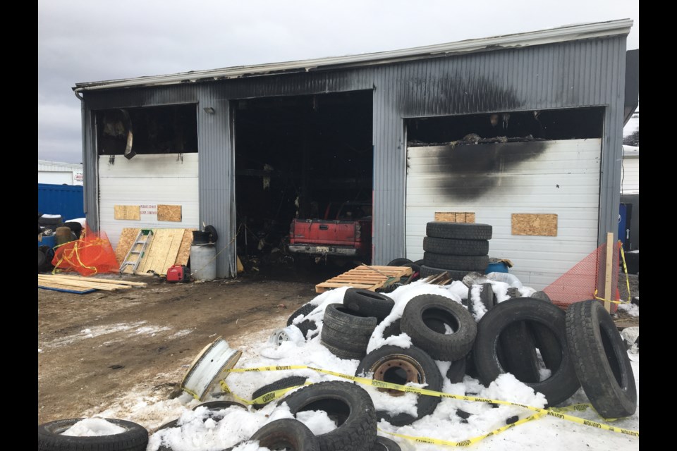 A view of the damage outside the Cholette Street tire business Monday morning.  Photo by Chris Dawson/BayToday.ca. 