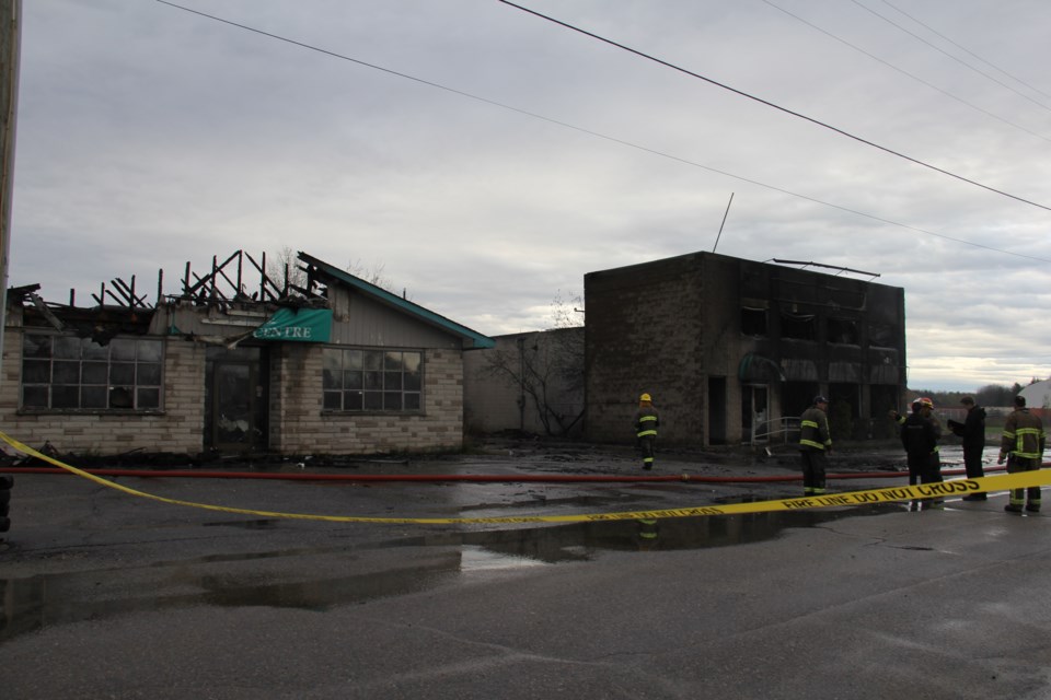 Fire Tuesday night destroyed Stradwicks Carpet One in North Bay.