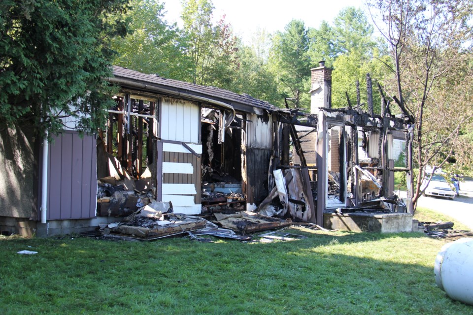 A fire Sunday morning completely destroyed this Highway 63 home. Photo by Jeff Turl.