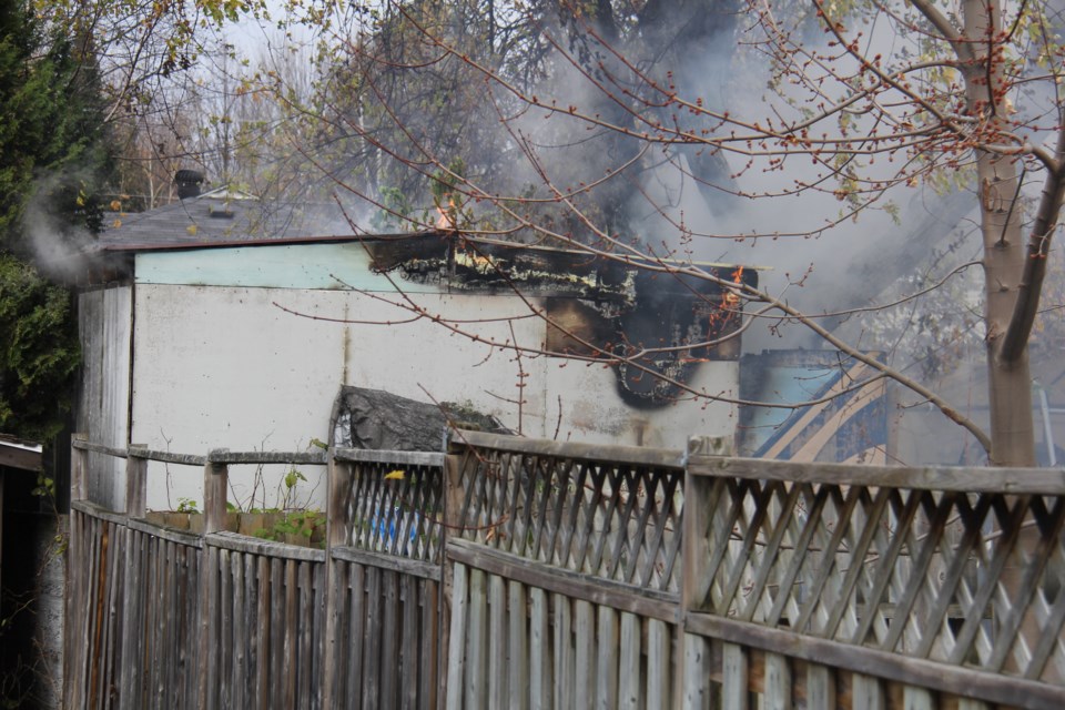 Firefighters were called out Friday afternoon to this shed fire. Photo by Jeff Turl.