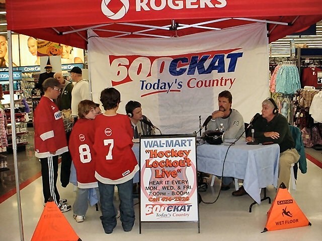 CKAT's Hockey Lockout Live at Wal-mart with former NHLers Bill Houlder and Larry Keenan.  Photo courtesy CKAT. 