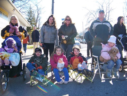 Parents and children enjoying the 2007 Christmas Parade