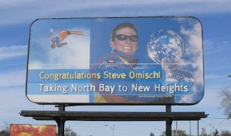 Steve Omischl's billboard overlooks the Lakeshore Drive overpass. Photo by Levi Perry, Special to BayToday.ca.
