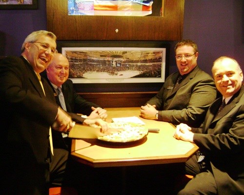 Mayor Vic serves up a slice to Gibb and BP execs