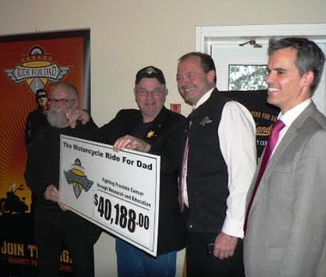 Cheque presentation at the Motorcycle Ride For Dad media launch Wednesday. From left Co-chair Chopper Cameron, Terry Daigle, Mayor Al McDonald, Craig Dellandrea, Assistant to MPP Vic Fedeli