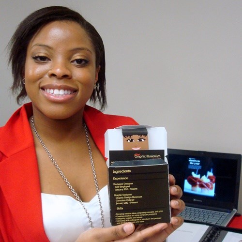 Justinea Richards shows off her pop up resume box