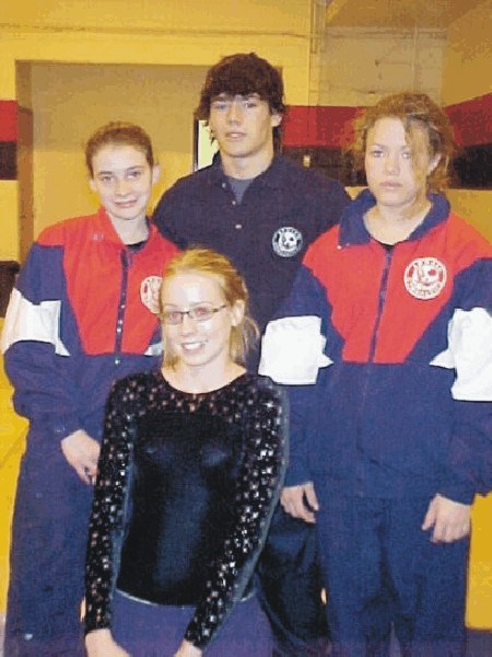 Josh Tessier, the provincial tumbling coach at Apollo, is with Kathleen McParland, Candice Heal and Natalie Fraser.