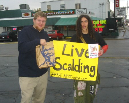 A protestor and a KFC customer. Photo by Bill Tremblay.