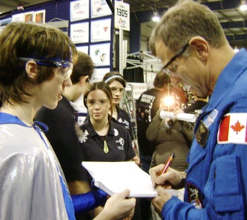 Captain Ice3 gets Canadian Astronaut Dave Williams autograph photo by Kate Adams