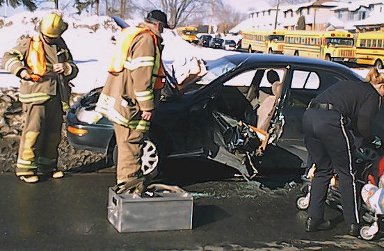 Paramedics and Members of the North Bay Fire Department see to the driver.