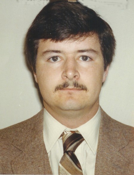 Paul Cook, in his rookie photo with the North Bay Police Service.