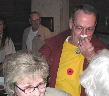 Vic Fedeli's father-in-law Chuck Kelly, in yellow shirt, was overcome with emotion when the city's new mayor entered city hall.