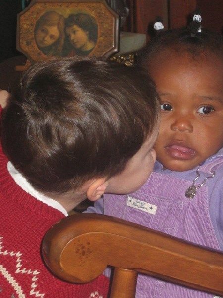 Taylor Martineau, the son of Alison's friends Tom And Deirdre Martineau, gives Zoe a peck on the cheek.