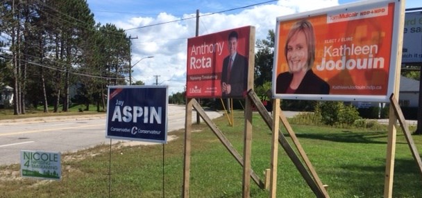 2015 9 21 election 4 candidate signs turl