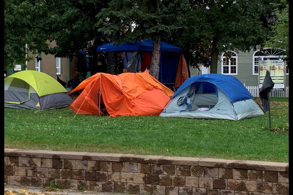 Homeless people have set up a tent city on the lawn of North Bay City Hall. ChrisDawson/BayToday.