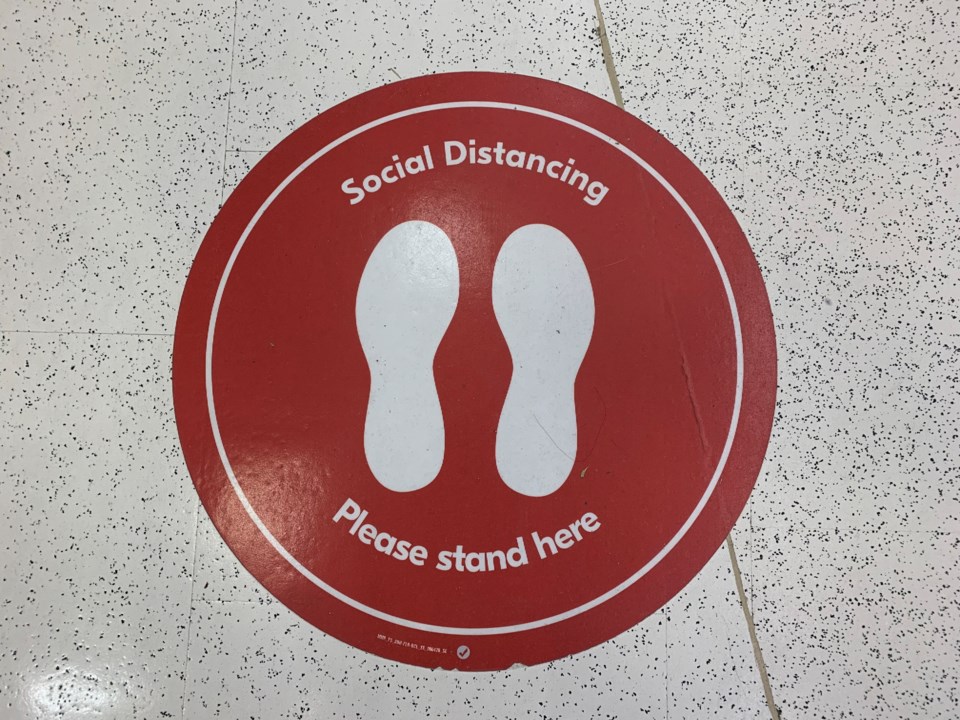 20201017 covid social distancing dot on floor turl