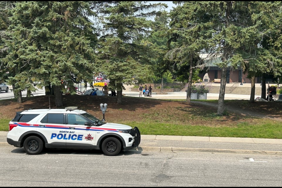 City police keeping an eye on the homeless at City Hall this week.