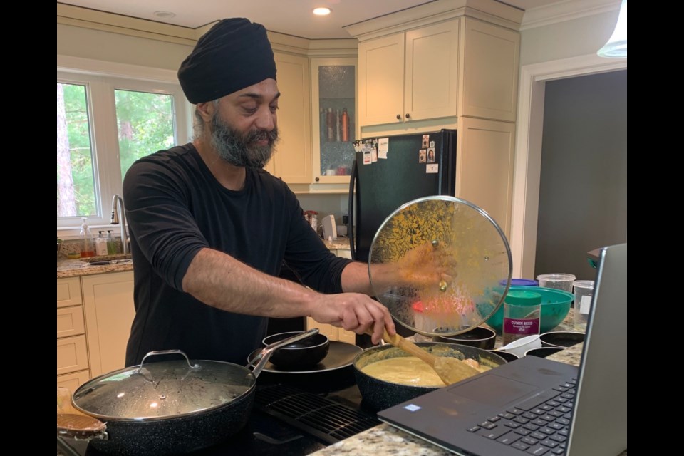 Dr. Singh during a "Cooking with Dr. Sing" cooking class. Photo provided by North Bay Regional Health Centre Foundation. 
