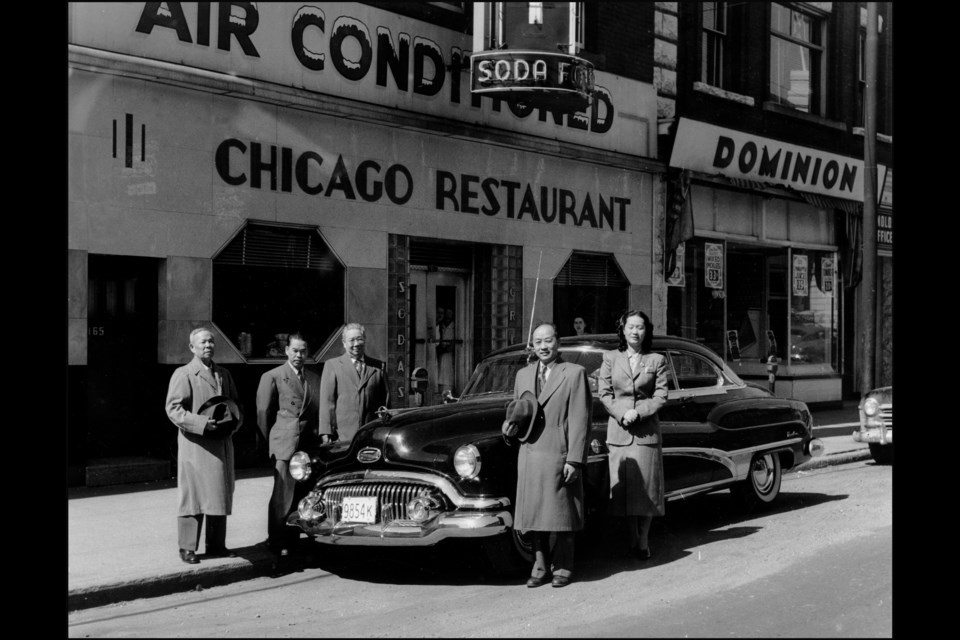 Original owner of the Chicago Cafe, Young Sing and wife Anna are pictured to the right of the Buick. This photo was taken in 1951. Photo courtesy Ed Eng.