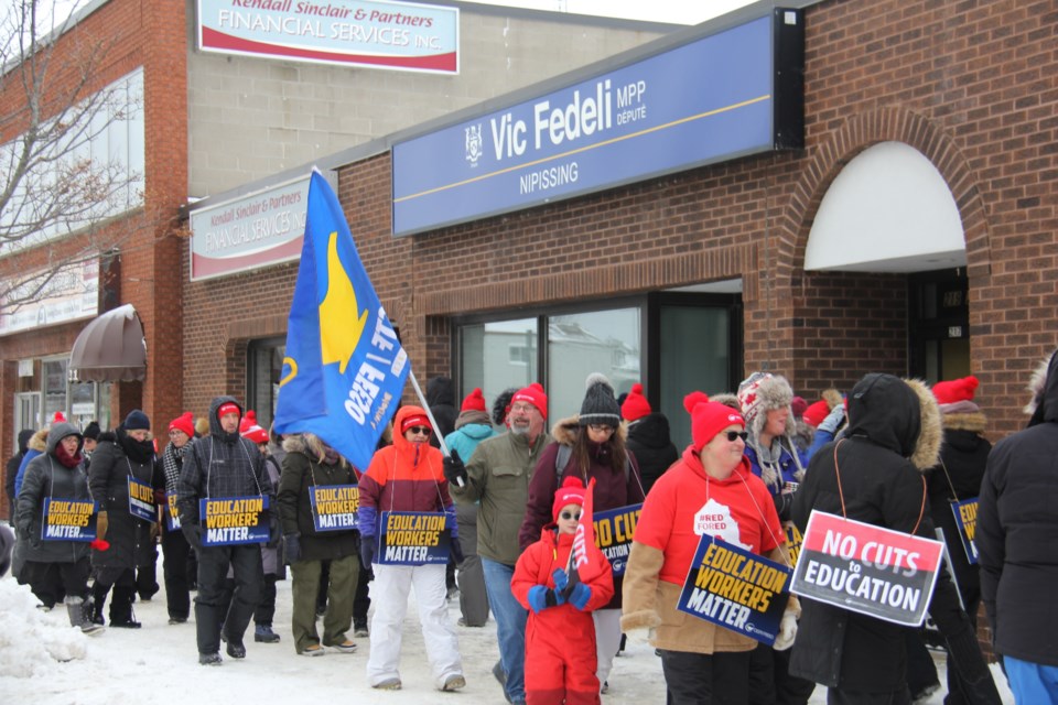 OSSTF education workers picket outside Nipissing \Mpp Vic Fedeli's office Tuesday. Jeff Turl/BayToday.