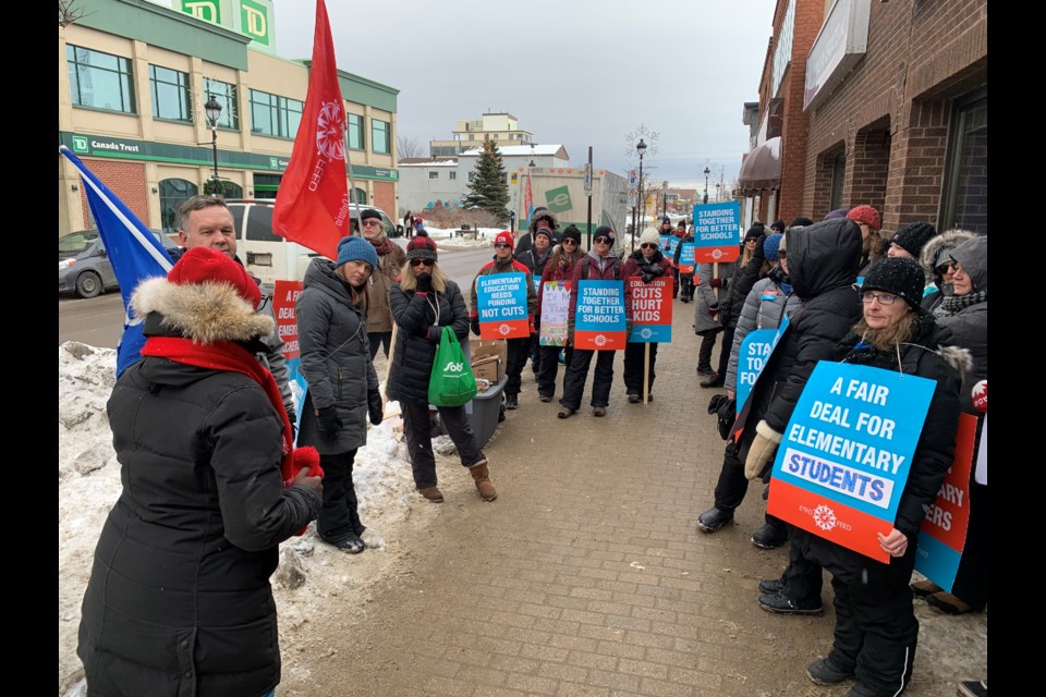 Karen Campbell, EFTO First VP, talks to teachers outside Vic Fedeli's office Tuesday afternoon.  Photo by Chris Dawson/BayToday. 