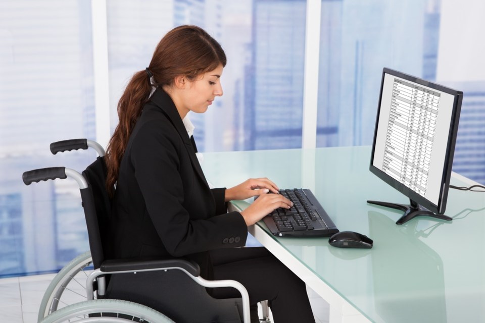 disabled worker woman shutterstock_204413236 2016