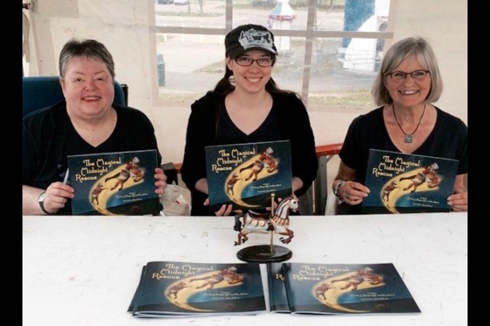 (Left to right) Co-Author Marla J. Hayes, Illustrator Skye Hilliard, Co-Author Martha Attema at the book launch of The Magical Midnight Rescue. Photo by Linda Holmes. 