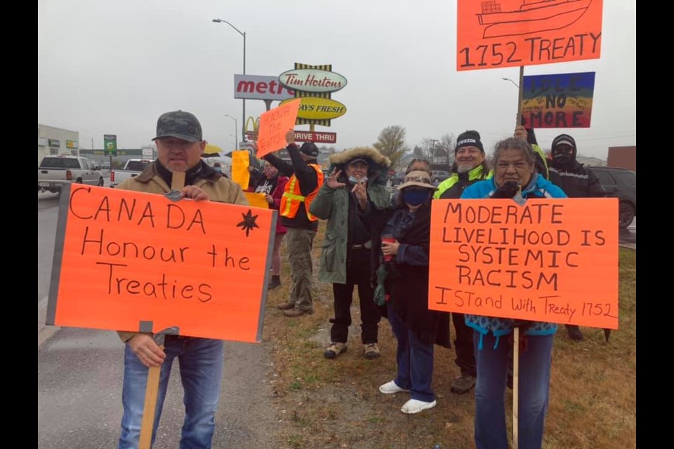 Nipissing First Nation members joined Alex Maloney in solidarity with his Mi'kmaq community relatives with a peaceful protest in Sturgeon Falls, Friday. Facebook Photo