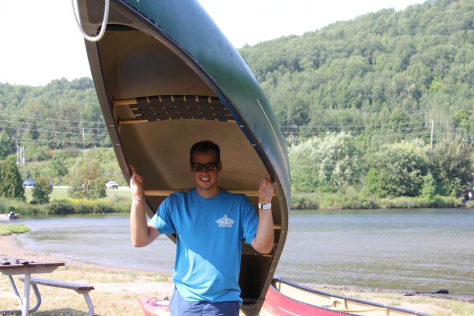 USED170824 3 Sam Armstrong, 25, coach paddle camp, Olmstead Beach. North Bay. Photo by Brenda Turl for BayToday.