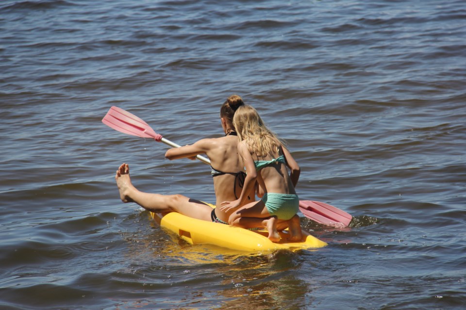USED 170706 2 The Lewicki sisters go for a shallow paddle on Lake Nipissing. Photo by Brenda Turl for BayToday.