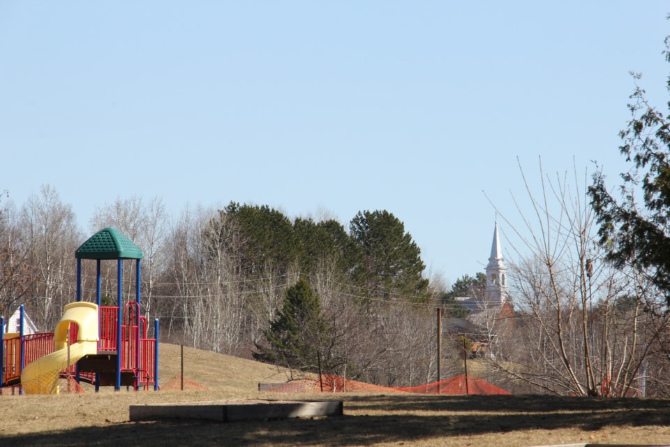 170518 1 Kaibuskong Park and playground with Ste Bernadette steeple, Bonfield, On. Photo by Brenda Turl for BayToday