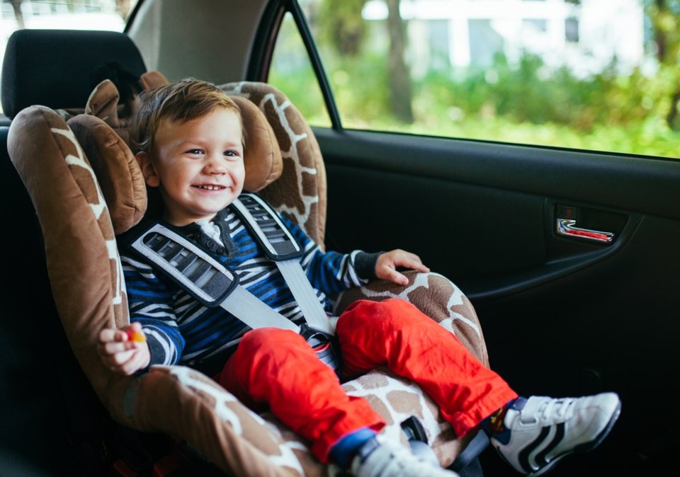 car seat with child shutterstock_323810267 2016