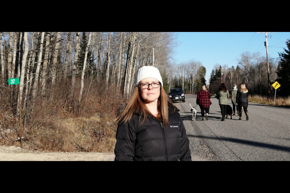 Maggie Preston-Coles opposes a 25-lot subdivision plan she says will increase traffic and make it less safe for pedestrians walking along sidewalk-less MacPherson Drive and Centennial Crescent in East Ferris. Dave Dale Photo