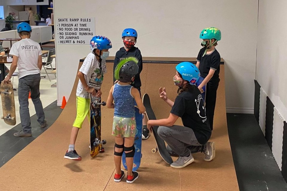 Steven Kudla (far left) and Amber Moffatt (bottom right) are sharing their skateboard expertise with the kids at OUTLoud North Bay.