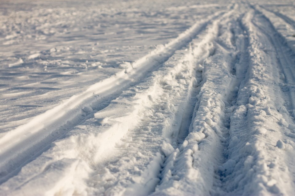 snowmobile tracks on ice AdobeStock_118521429 2016