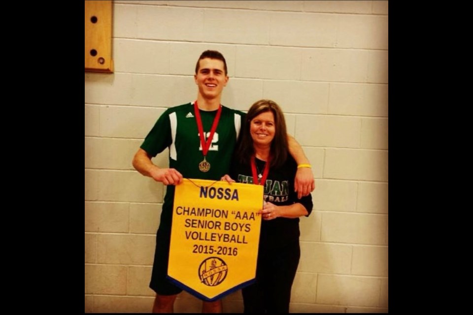 Wendy Brear with son Jackson after winning the NOSSA Senior Boys Volleyball Championship. 