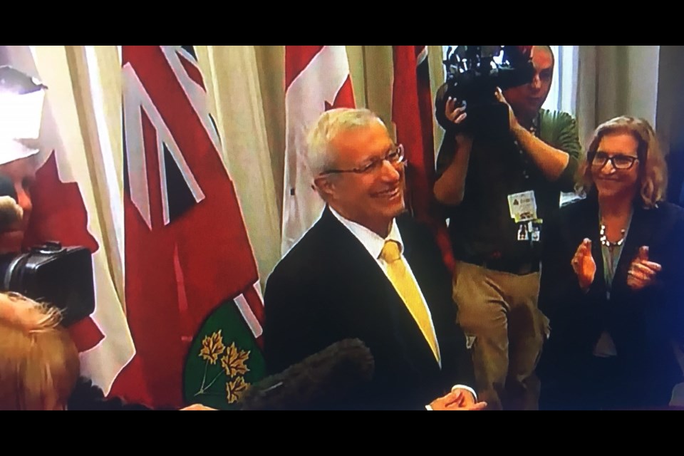 Vic Fedeli accepts congratulations from caucus members after being named interim leader on Jan. 26.