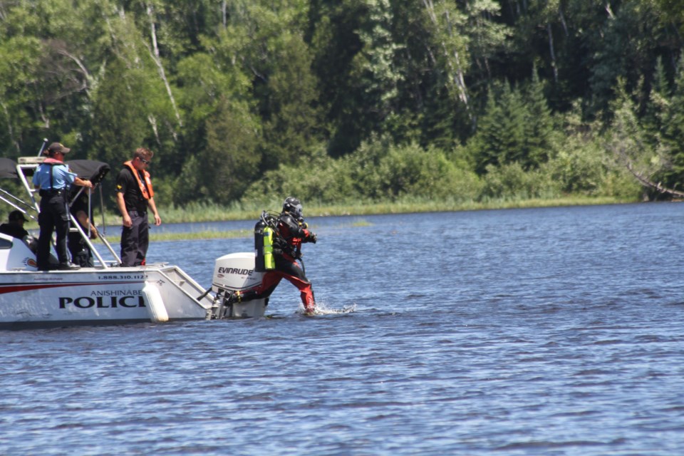 Opp divers assisted in the search of the Sturgeon River.  Michelle Giroux Scott