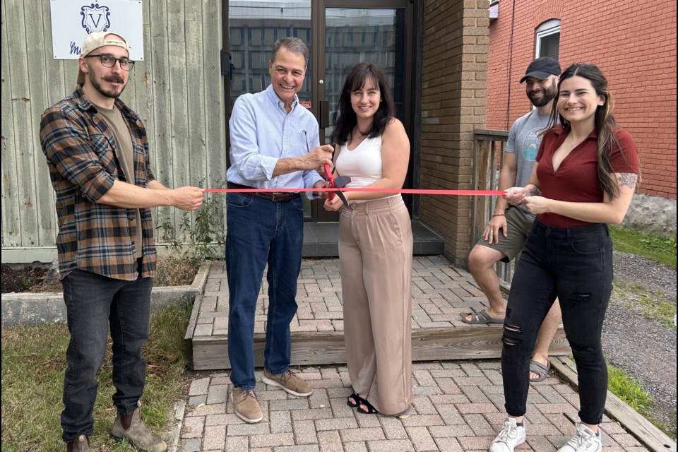 MP Anthony Rota cuts the ribbon on the new studio.