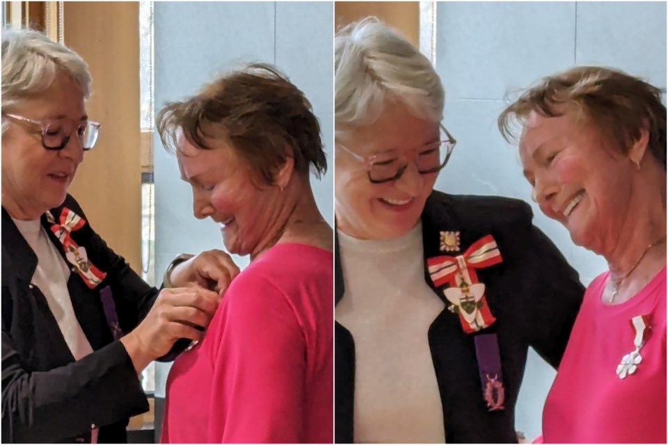 Lt. Gov Edith Dumont invests North Bay's Mathilde Gravelle-Bazinet into the Order of Canada.