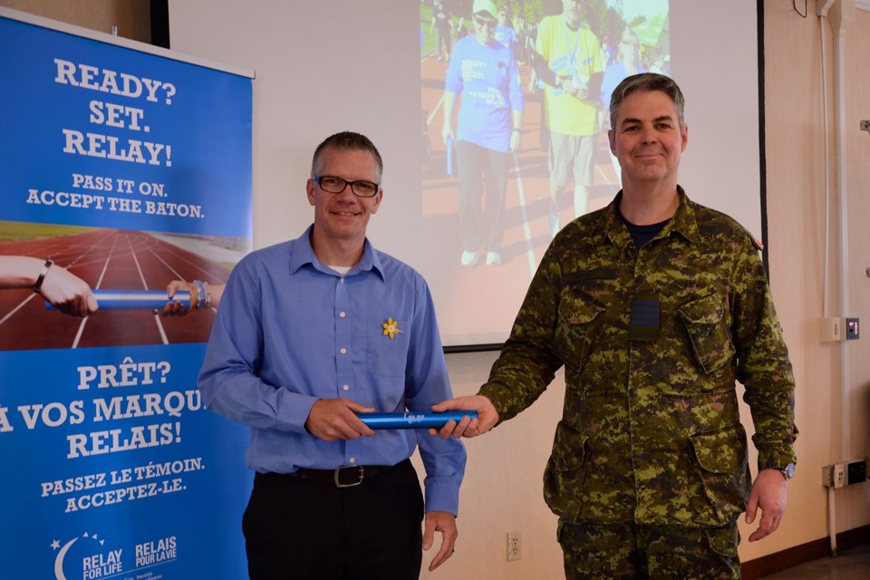 Pharand, gil of the Canadian Cancer Society passed baton to Colonel Henrik Smith, 22 Wing Commander,  2016